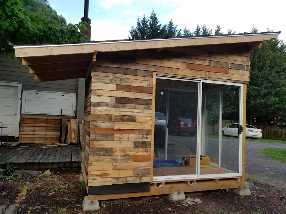 Cat Managerie pallet siding